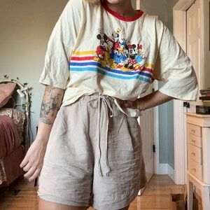 Retro style rainbow Micky Mouse shirt.